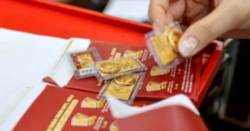 Giá vàng trong nước tăng mạnh, thế giới giảm nhẹ do áp lực chốt lời