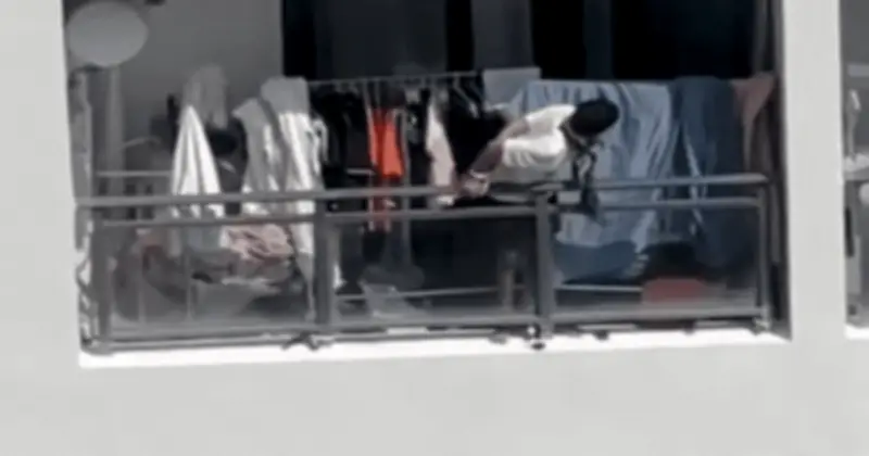 Video gây sốc: Người đàn ông bị trói tay cầu cứu từ ban công nghi là hang ổ lừa đảo ở Campuchia