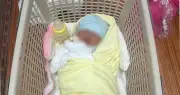 Bé trai 4 ngày tuổi bị bỏ rơi trong bụi chuối cạnh đường vào nghĩa trang