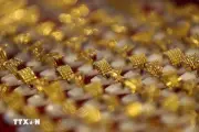 Giá vàng thế giới giảm mạnh do áp lực chốt lời và đồng USD phục hồi