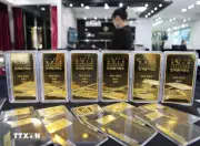 Giá vàng bất ngờ tăng mạnh khi USD và lợi suất trái phiếu Mỹ suy yếu