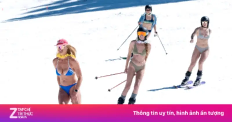 Du khách Mỹ đổ xô mặc áo tắm trượt vũng tuyết tan giữa nắng nóng kỷ lục