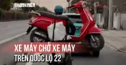 Người đàn ông chở ngang xe tay ga trên xe máy gây nguy hiểm trên Quốc lộ 22