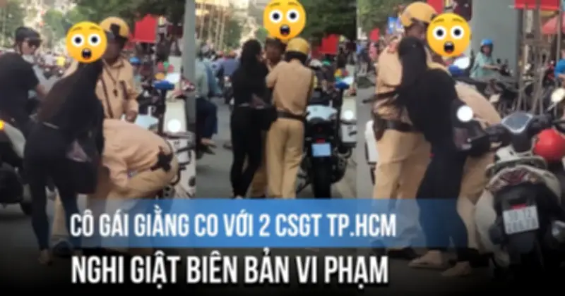 Cô gái giằng co với CSGT TP.HCM, nghi giật biên bản vi phạm giao thông