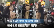 Cô gái giằng co với CSGT TP.HCM, nghi giật biên bản vi phạm giao thông