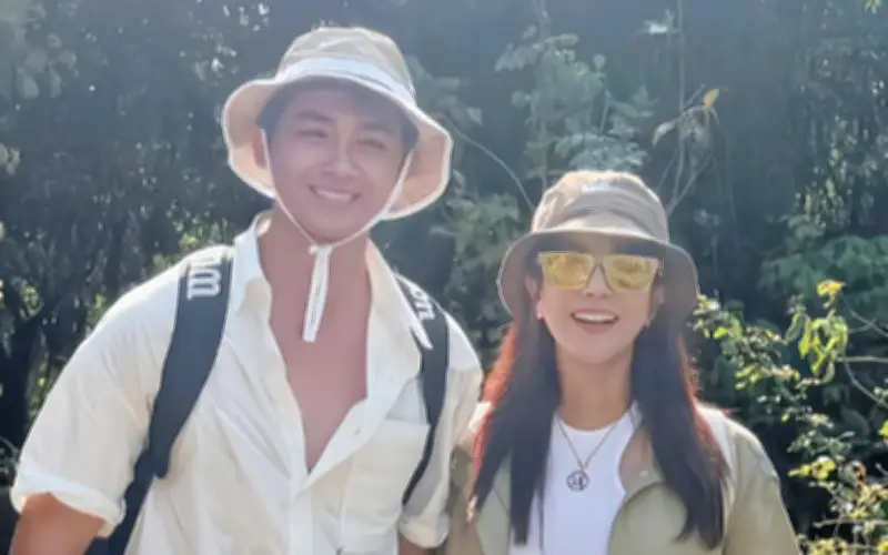 Diệp Lâm Anh và Phạm Kiên chinh phục đỉnh Đá Đỏ trong chuyến trekking lãng mạn