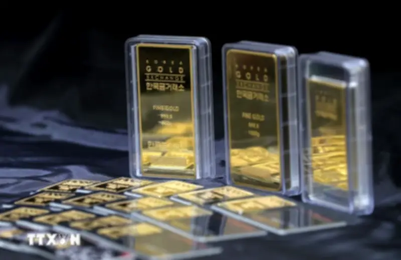 Giá vàng châu Á giảm từ đỉnh ba tuần do đồng USD mạnh lên