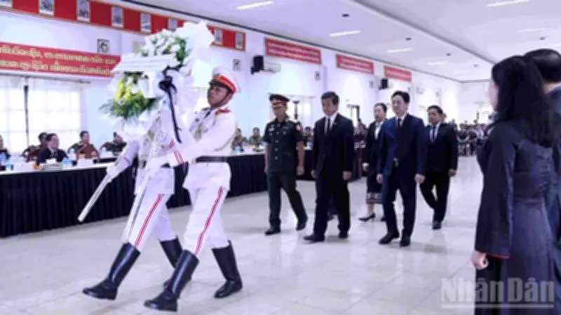 Lào tổ chức lễ tưởng niệm, bàn giao hài cốt liệt sĩ Việt Nam về nước
