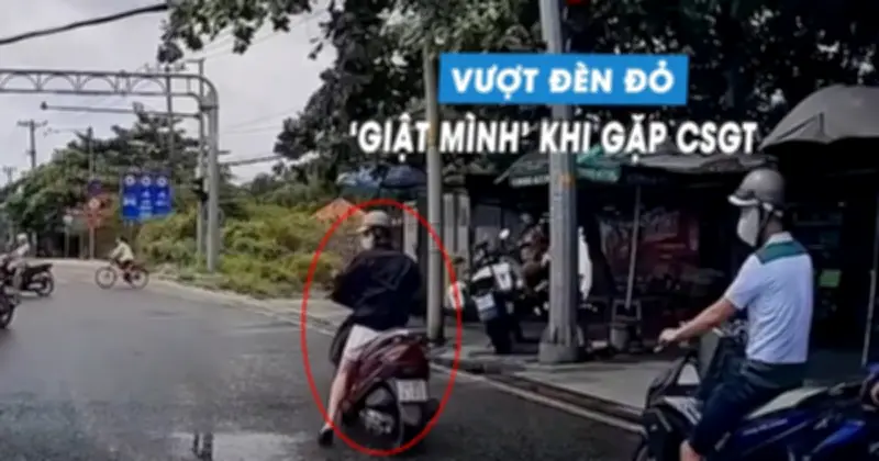 Thanh niên vượt đèn đỏ, thấy CSGT liền lùi xe về vạch