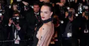Cara Delevingne gợi cảm với váy đen xẻ sâu trên thảm đỏ Cannes 2026
