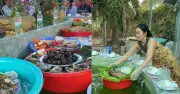 Mâm cỗ độc lạ ở An Giang: Heo quay, bánh tét… bày trên chậu nhựa giữa bể cá