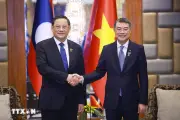 Thủ tướng Lê Minh Hưng gặp Thủ tướng Lào Sonexay Siphandone