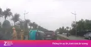 Tài xế buồn ngủ, taxi công nghệ lao vào dải phân cách lật giữa đường