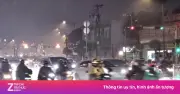 TP.HCM mưa lớn kèm sấm chớp tối cuối tuần, giao thông khó khăn