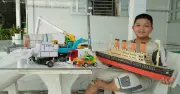 Cậu bé lớp 4 tái chế đồ chơi cũ thành máy gặt đập độc đáo