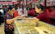 Giá vàng bạc lao dốc vì đồng USD mạnh và kỳ vọng Fed giữ lãi suất cao