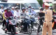 Không để trẻ em ngồi ghế trước ô tô từ 2026